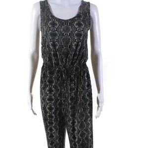 Calvin Klein snake print jump suit, size 4